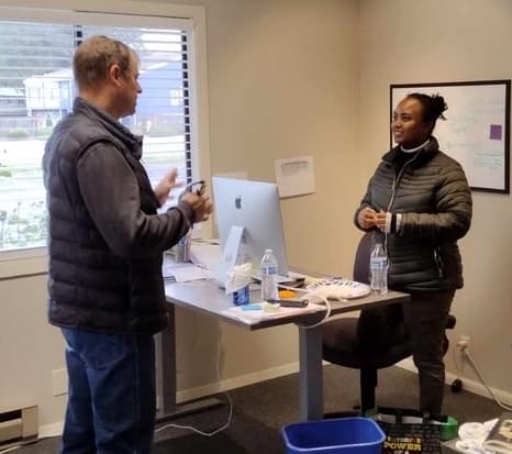 Man talks to woman in office about becoming a citizen